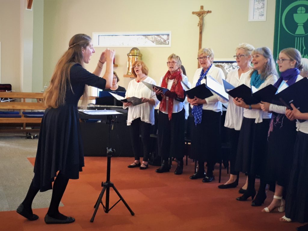 Ariane Duclos conducts the Choral Society in Mozart's Requiem